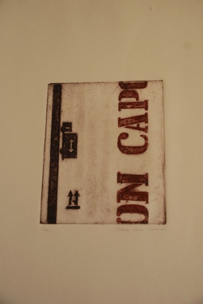 Vintage book cover with worn surface — print on found material by Elisa Sassera